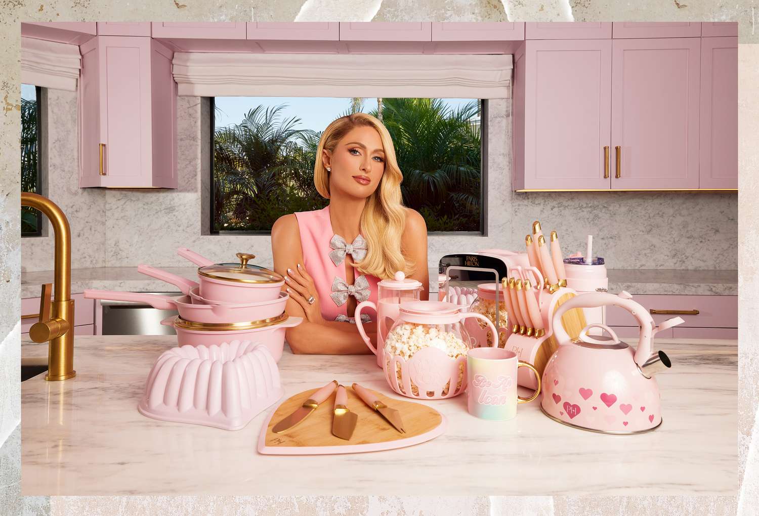 Paris hilton with her new cookware line Be an Icon collection