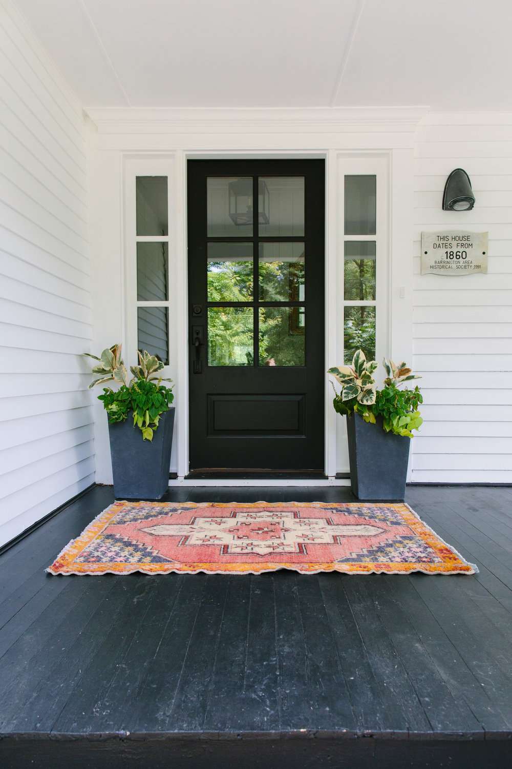 Vintage rug on a front porch