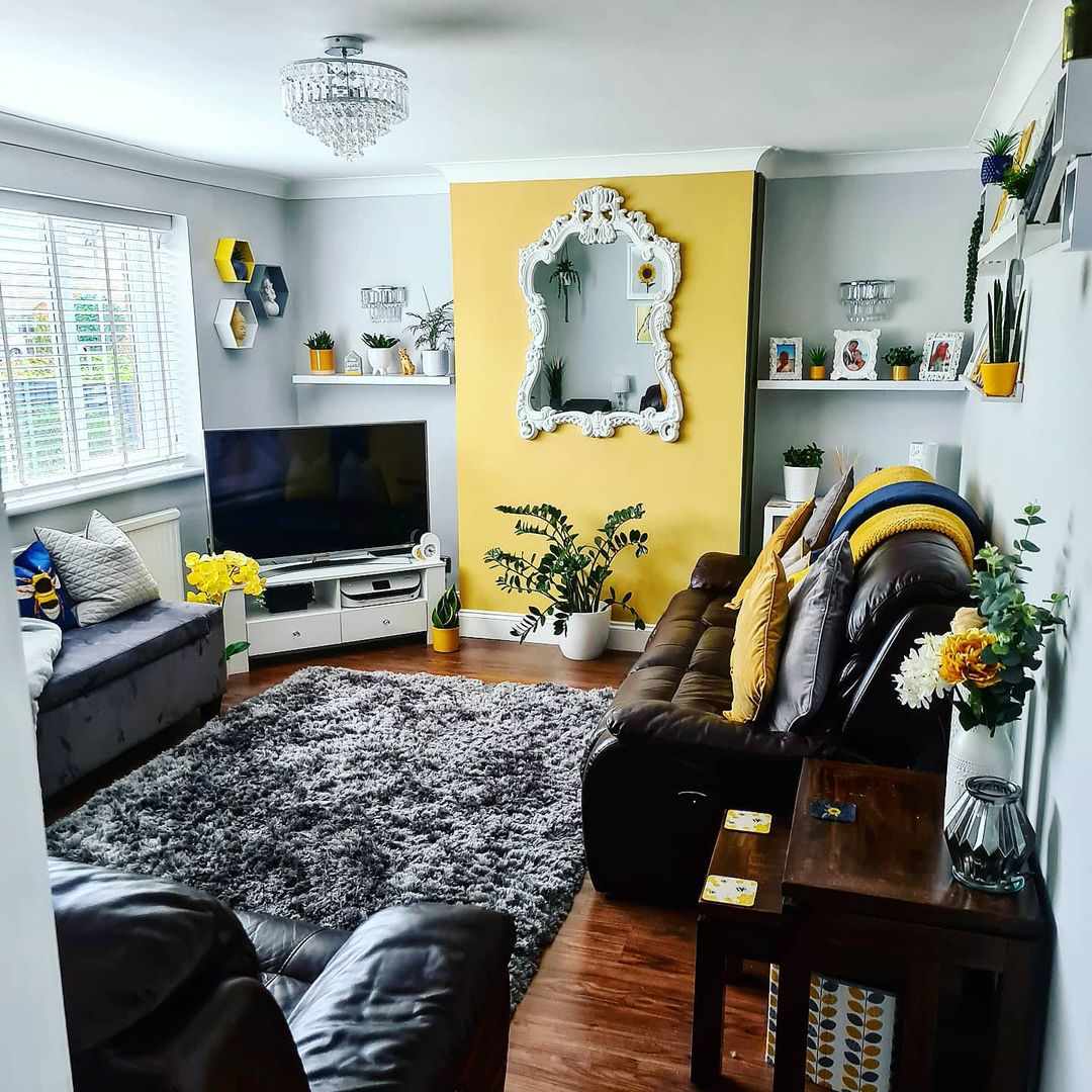 living room with one yellow wall