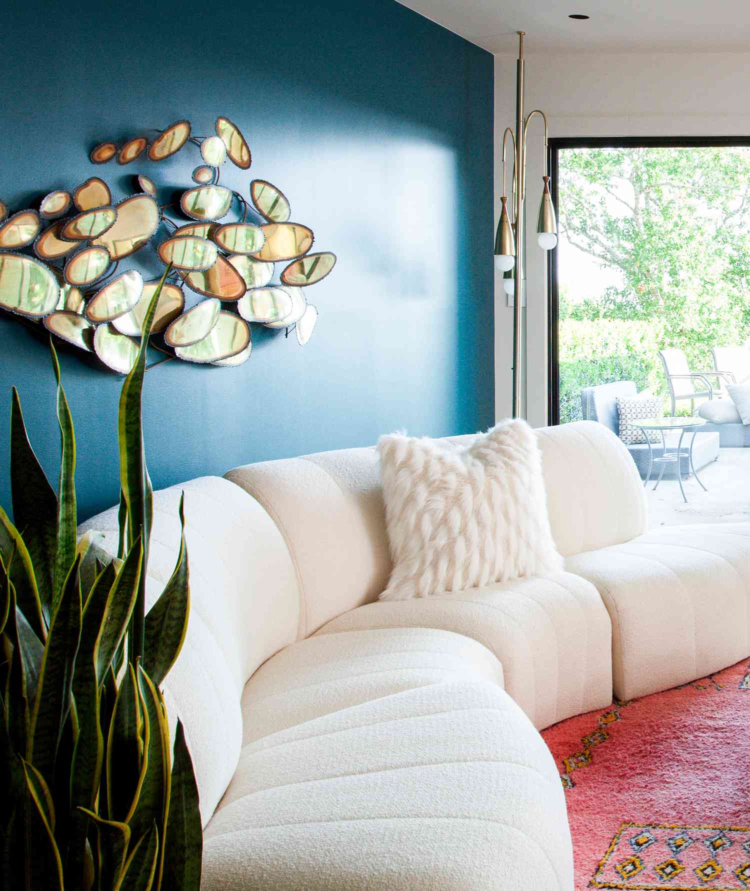 Teal accent wall with art