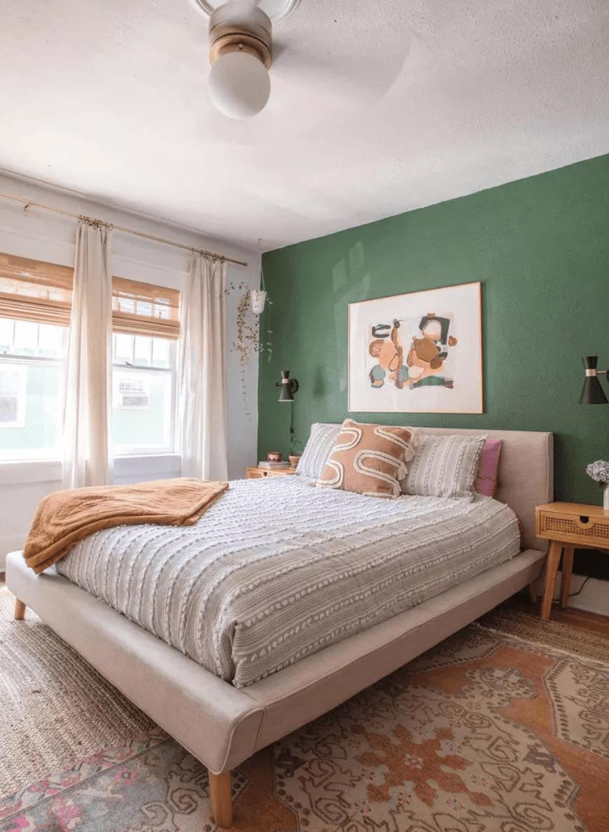 green accent wall in bedroom