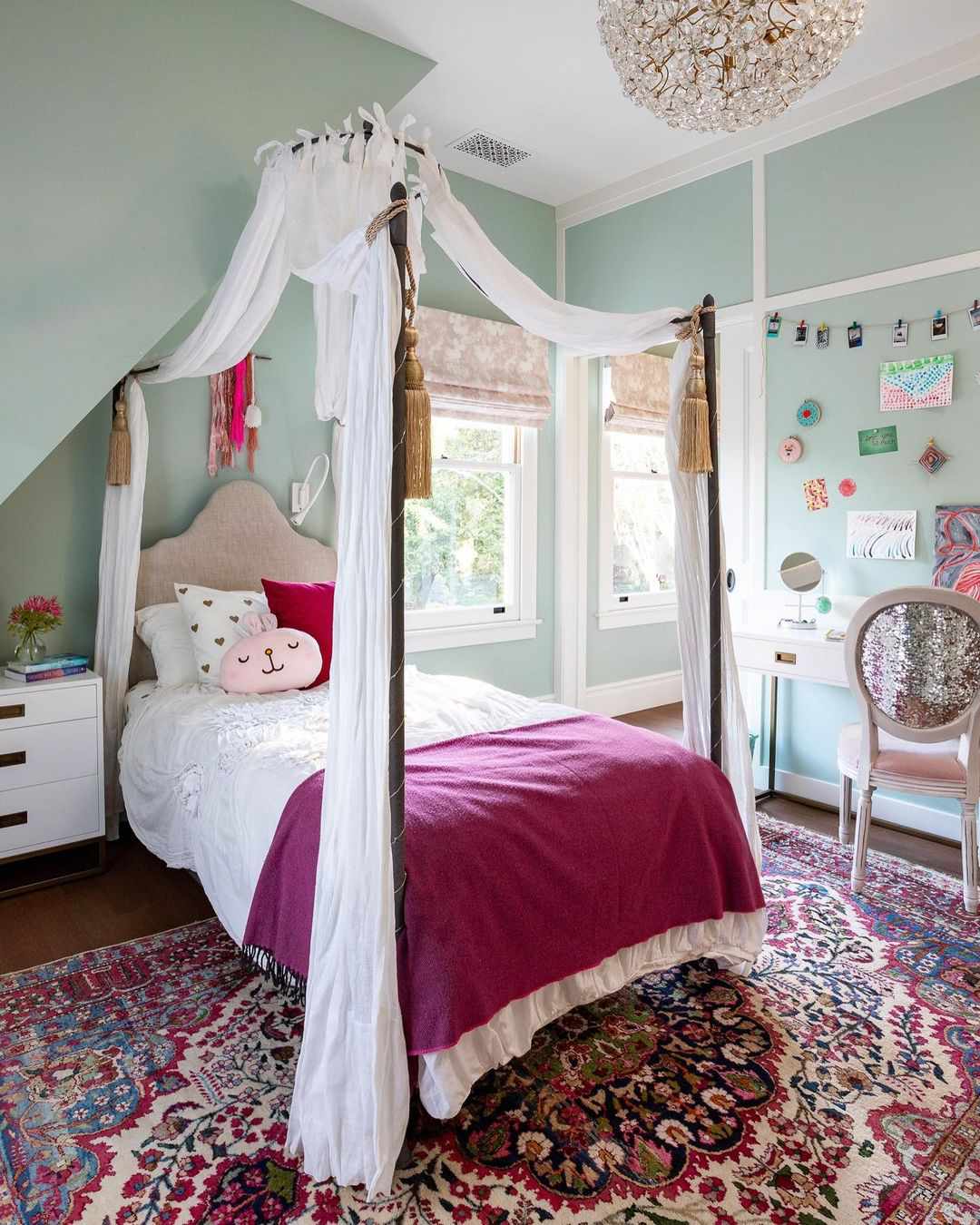 Mint green bedroom with fuschia accents.