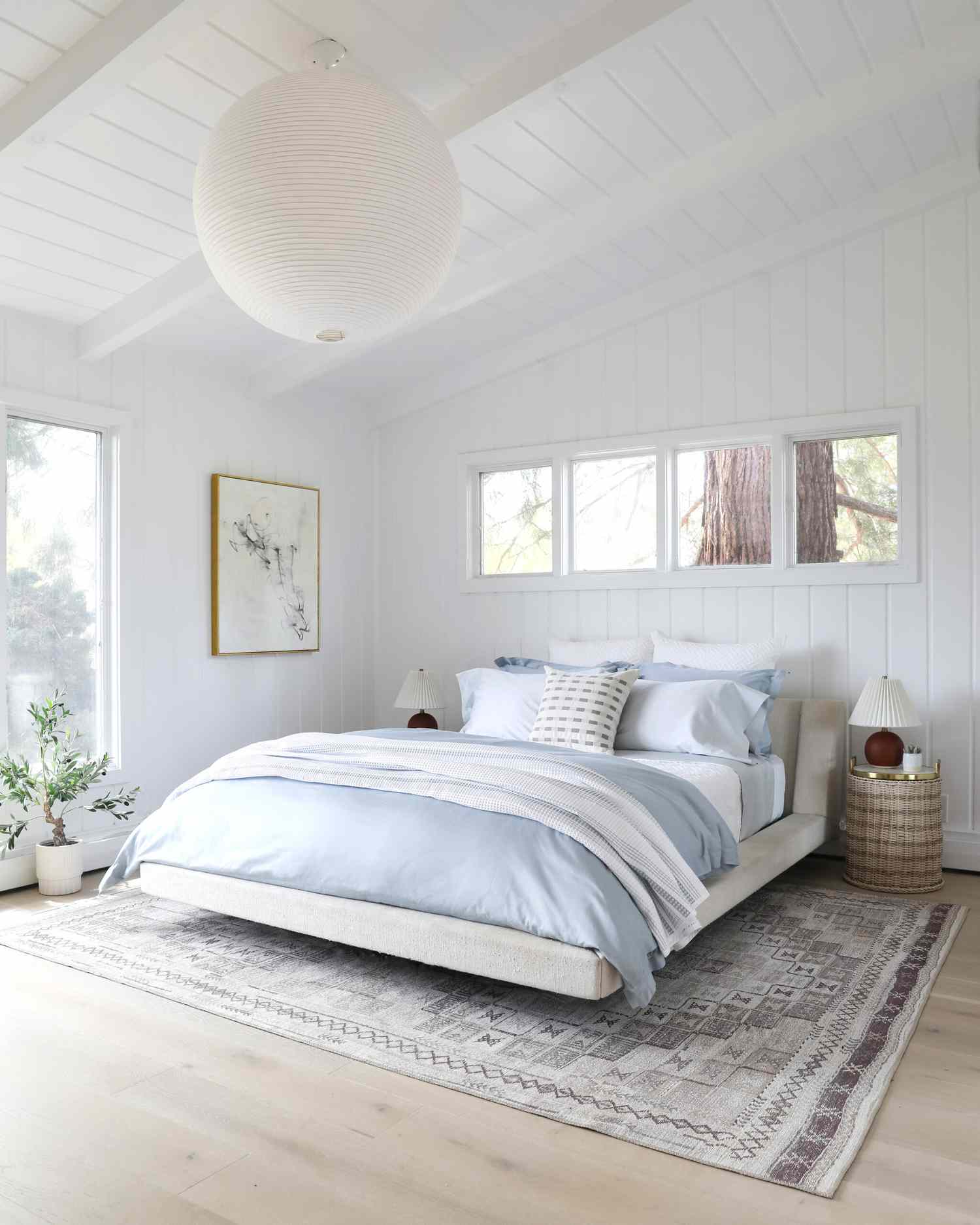 Wood accent wall ideas with white shiplap on walls and ceiling