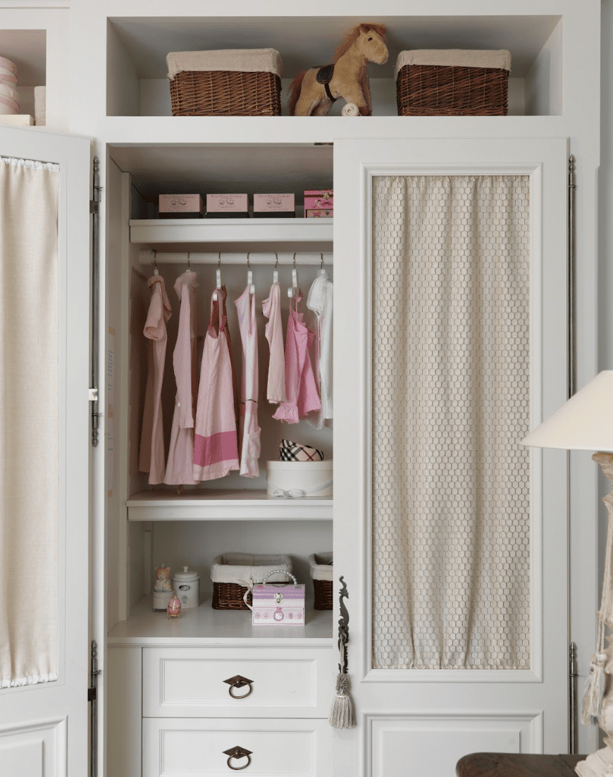 Closet lined with patterned curtains