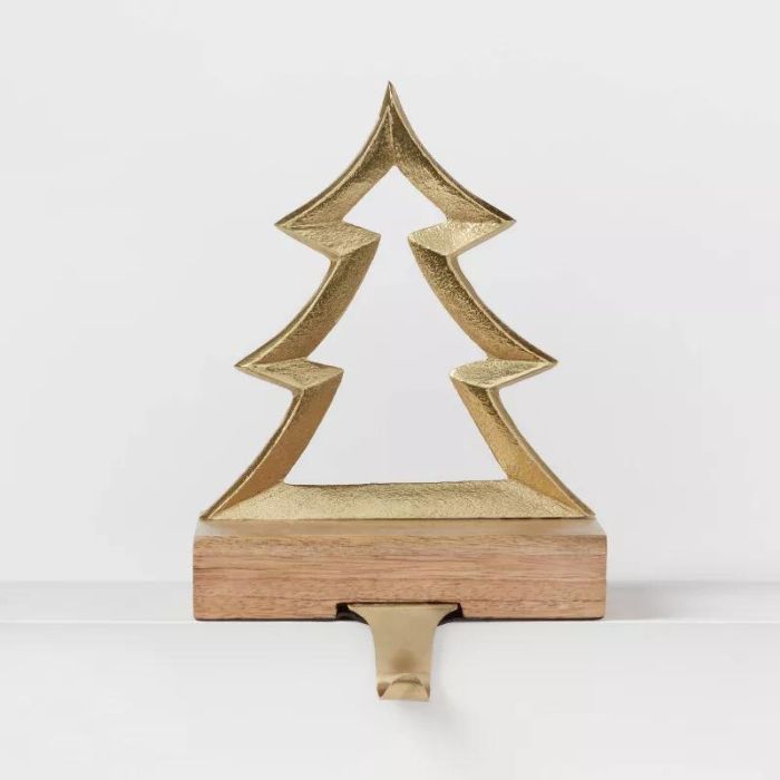 Metal Christmas tree stocking holder.