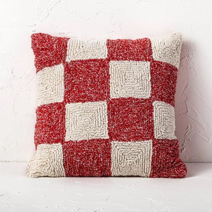 Tufted cotton checkerboard throw pillow for the holidays.
