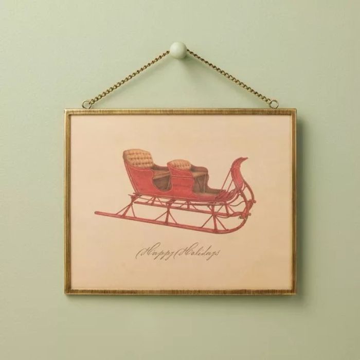 Vintage-style framed Christmas wall art.