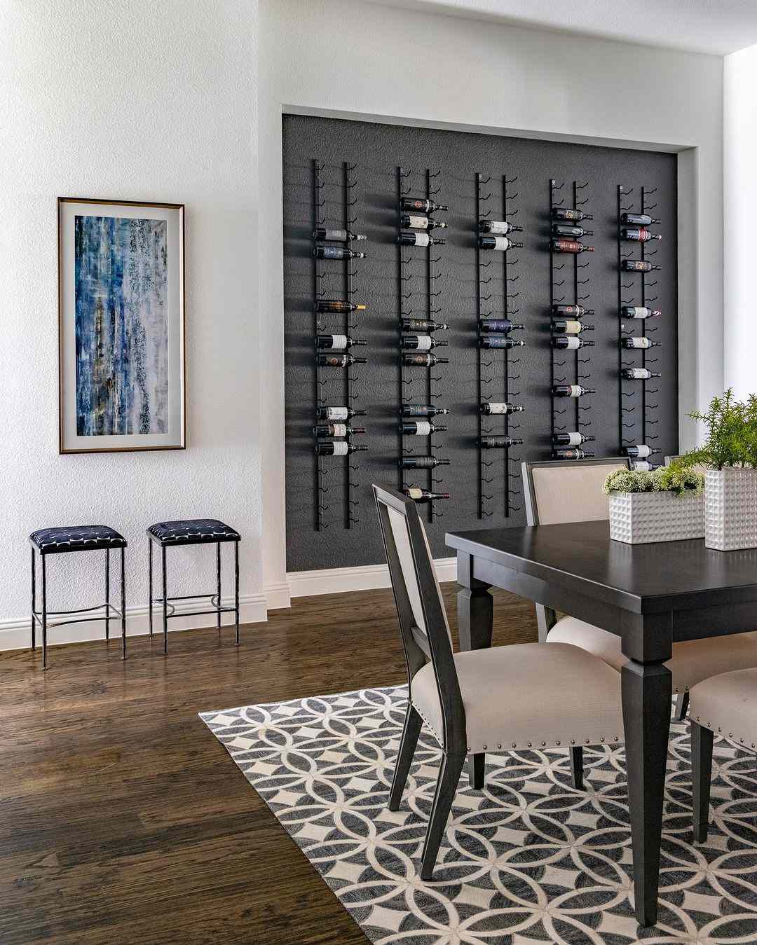 black wall with wine holders