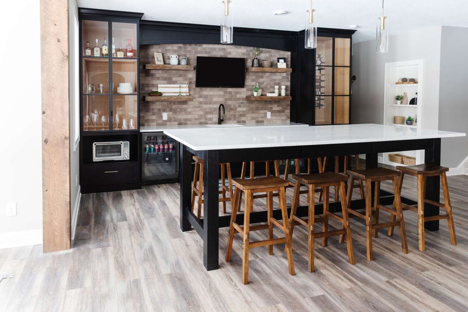 black cabinets and stone