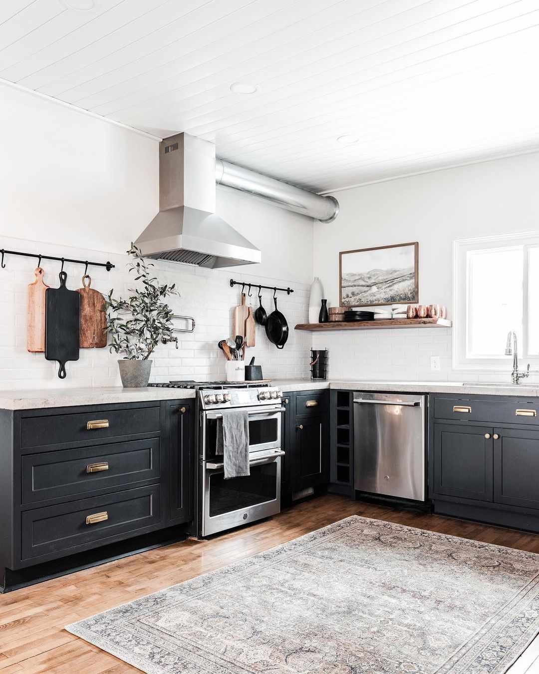 black cabinets and subway tile