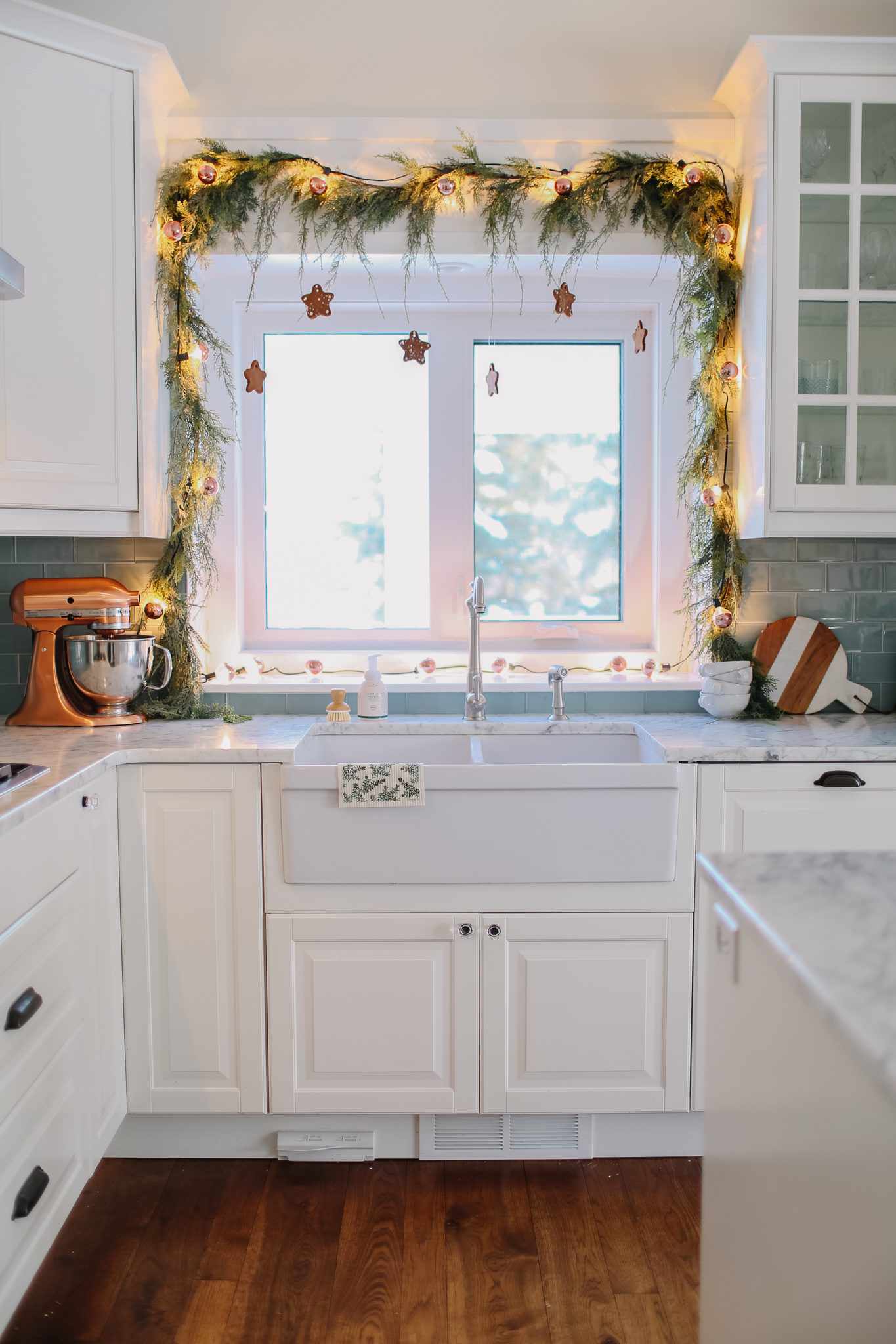 lighted window garland with hanging stars