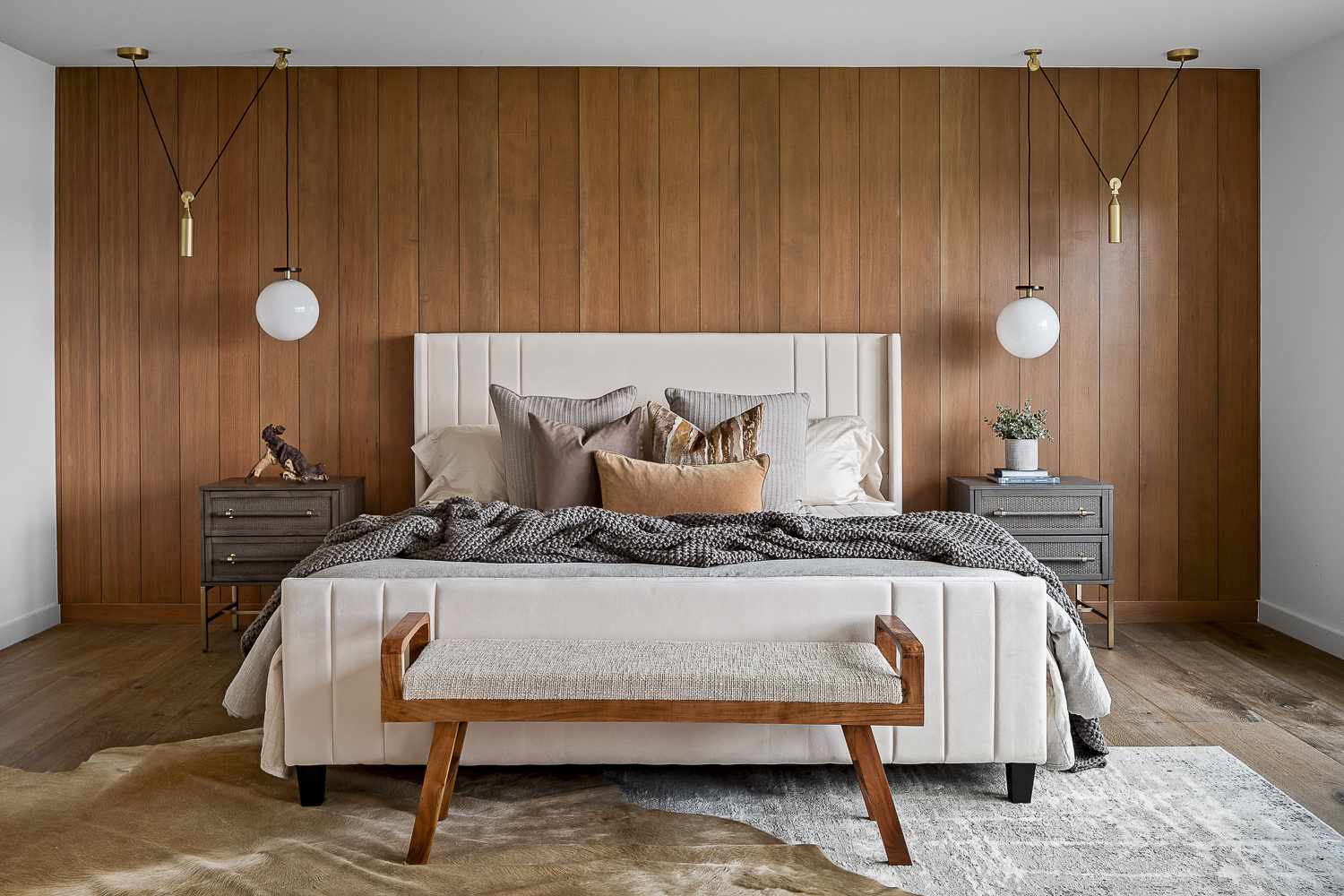Mid-century modern bedroom with grey and warm brown.
