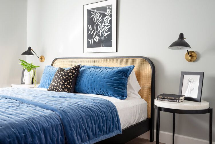 Mid century modern bedroom with blue and black.