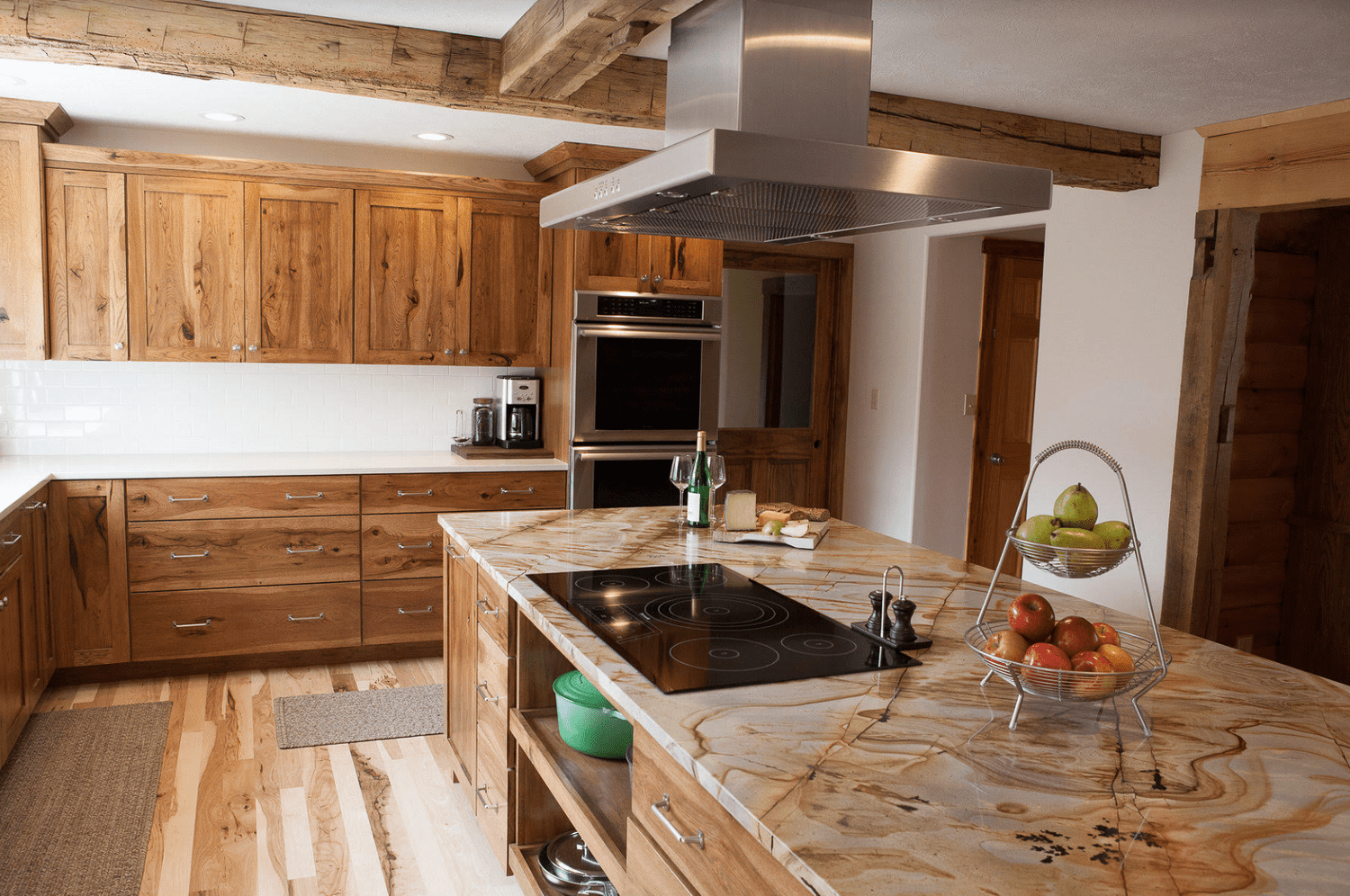 amber countertops and hickory wood cabinets