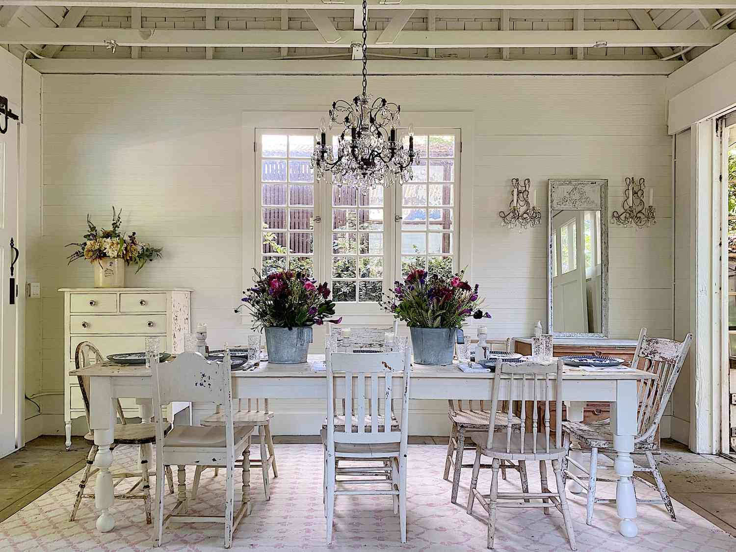 modern farmhouse dining room with mismatched seating
