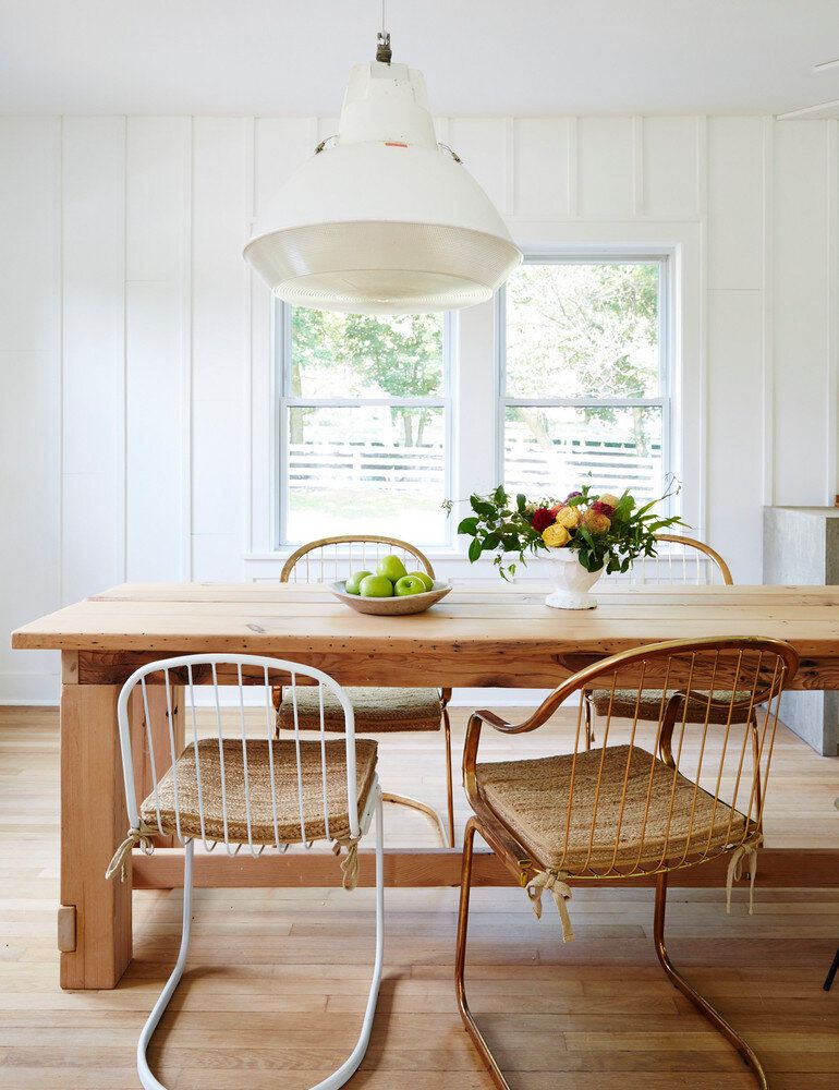 modern farmhouse dining room with board and batten walls