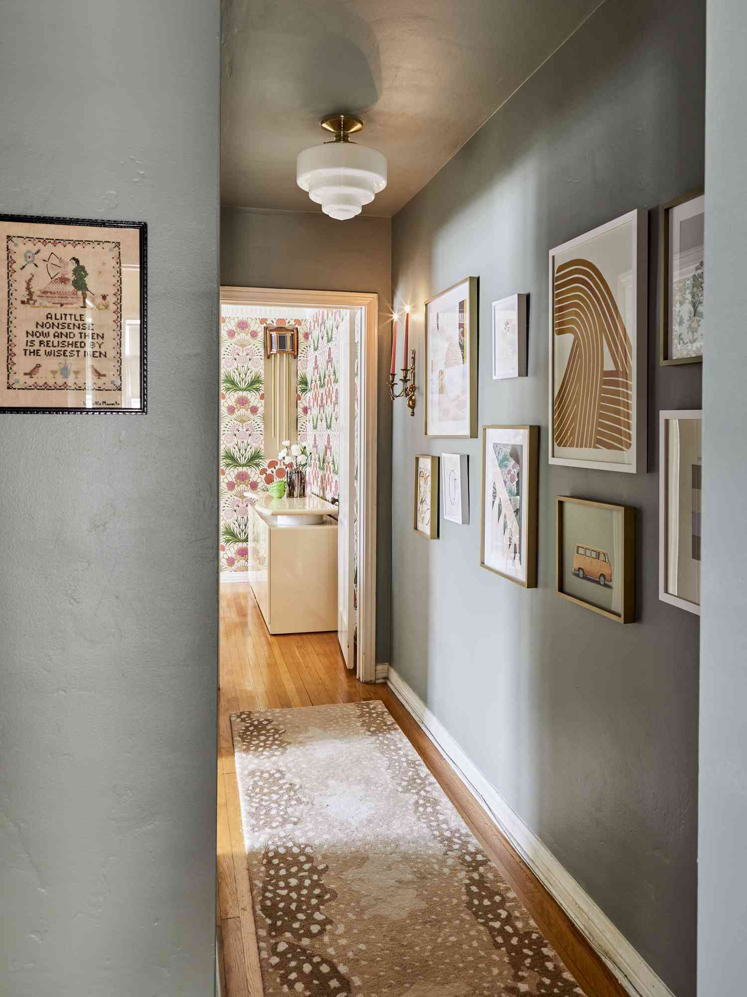 Hallway with an eclectic gallery wall