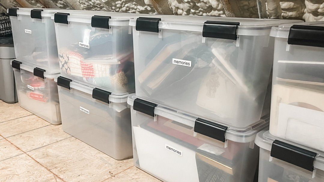 Clear storage bins with labels