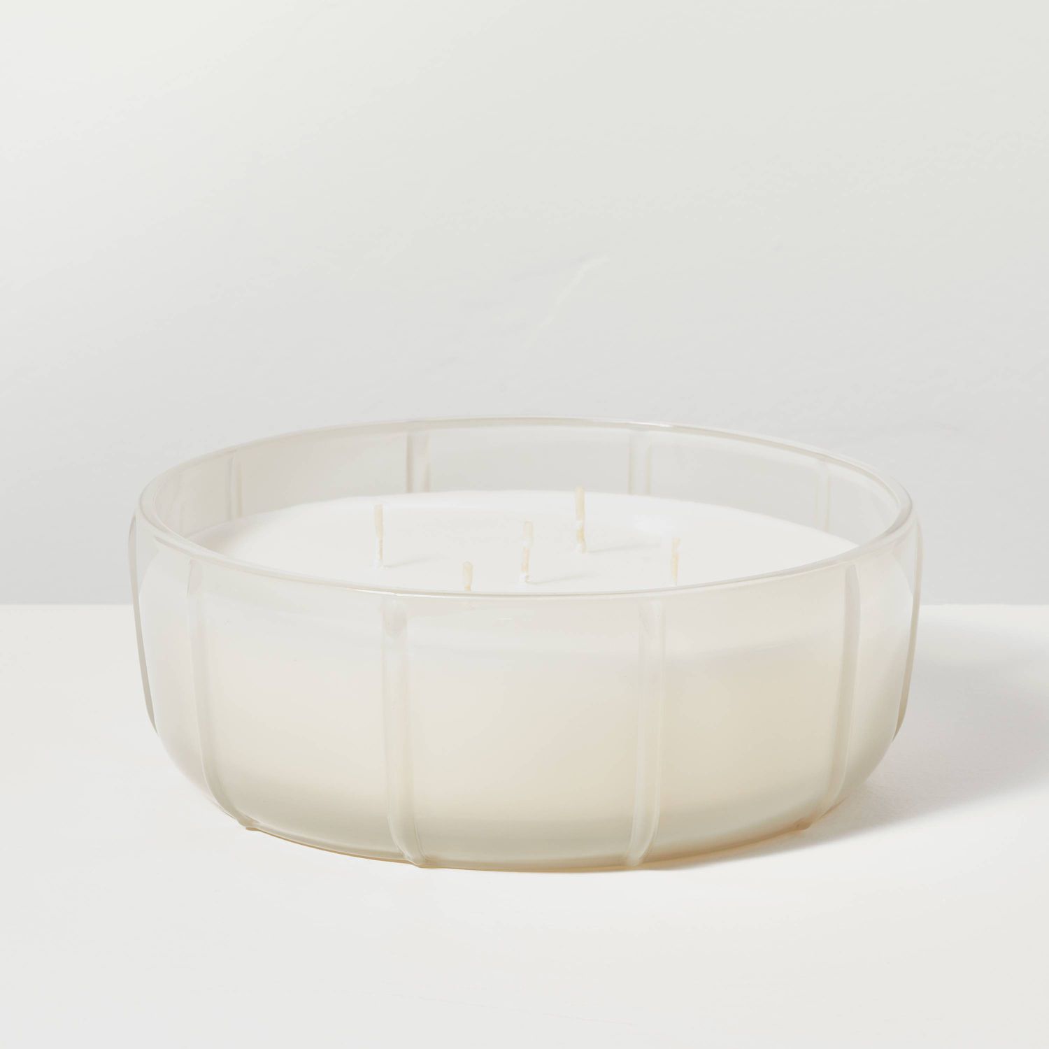 Clear glass ribbed candle