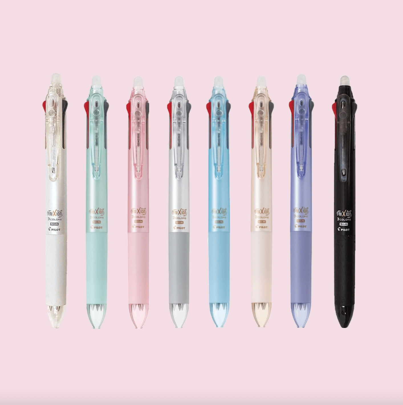 ligne de stylos sur fond rose