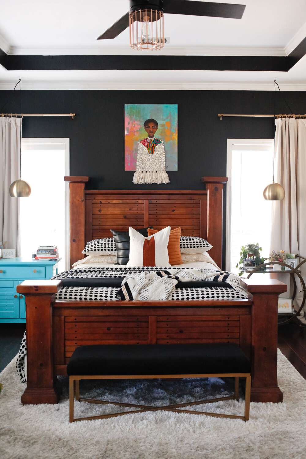 black accent wall primary bedroom
