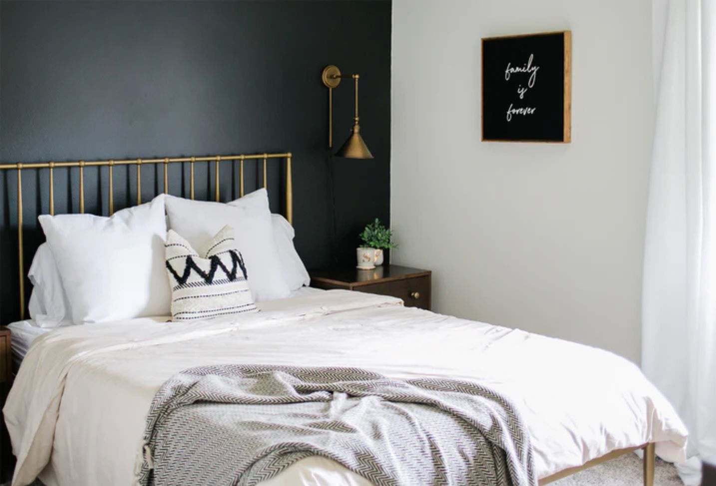 black accent wall guest bedroom