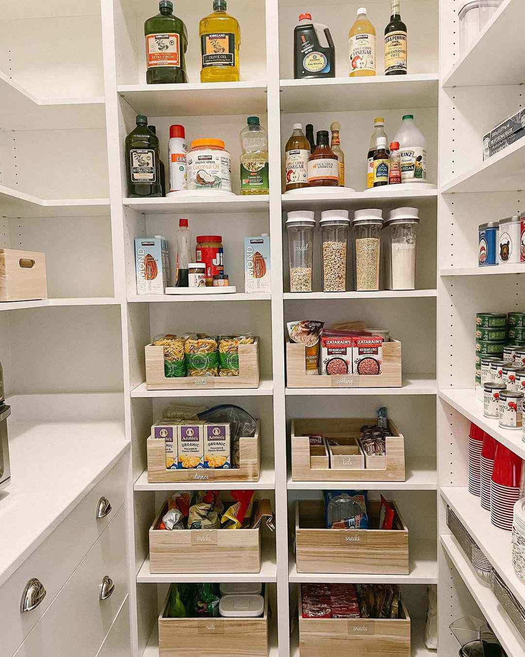 Organized Pantry with Lazy Susans, Clear Containers, and Bamboo Storage Bins