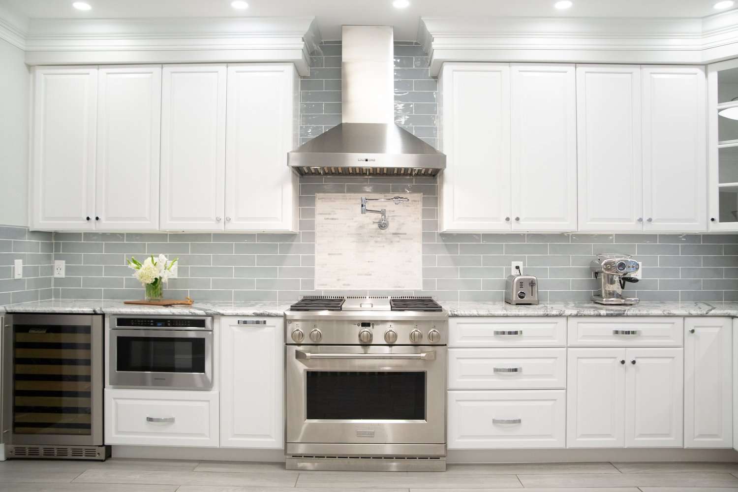 white cabinets with gray subway tile