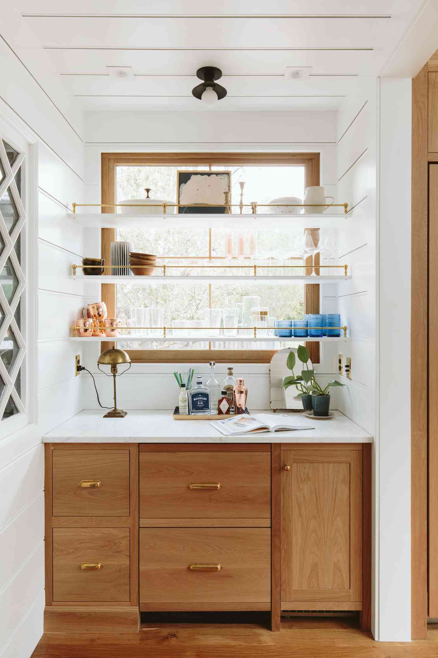 wood cabinets and a white counter