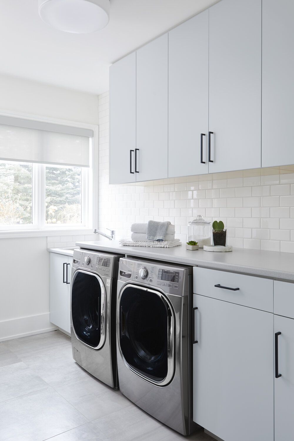 laundry machines in a clean laundry room