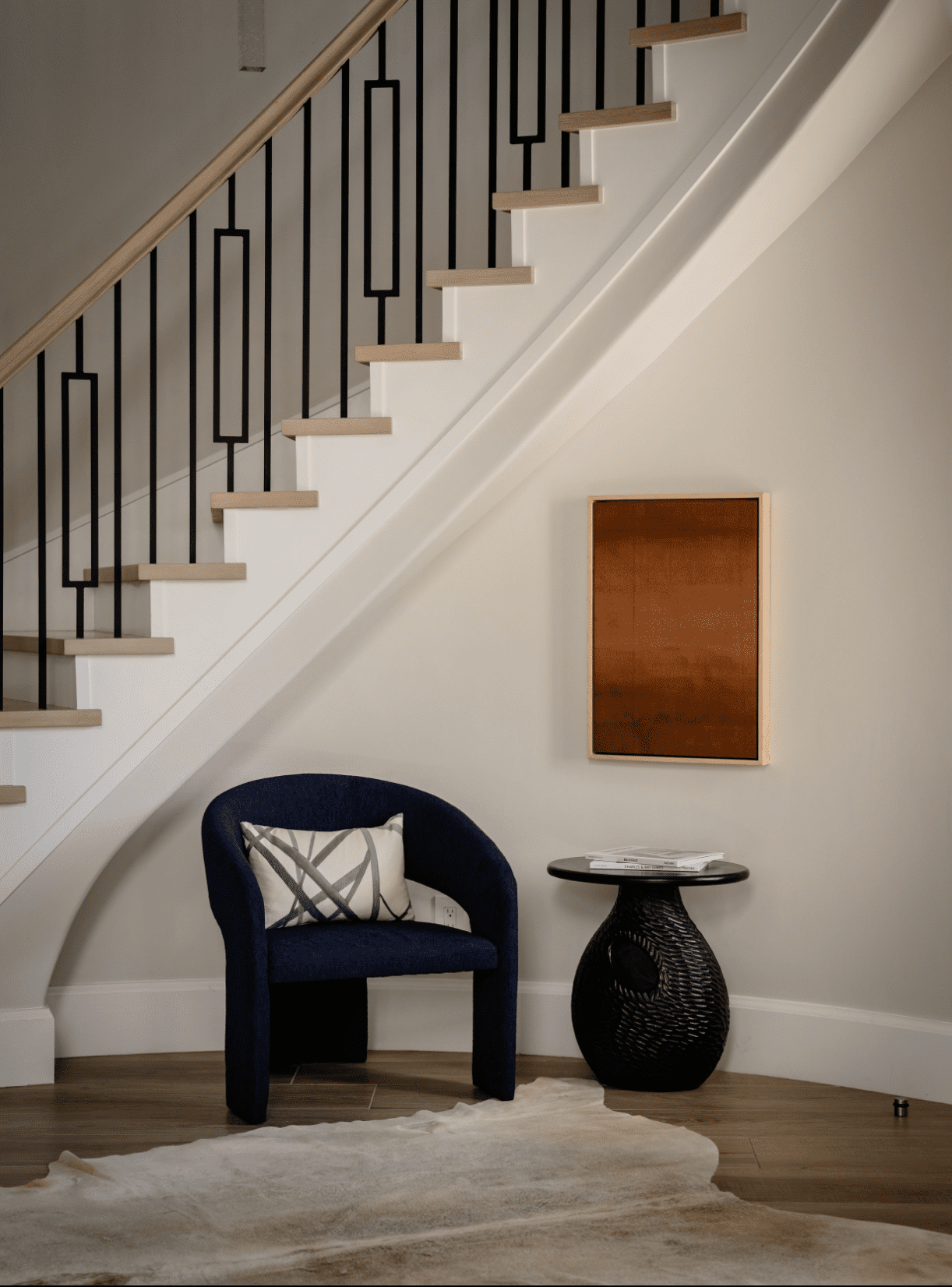 black chair with maroon art