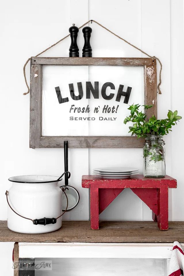 A lunch sign made out of a window frame