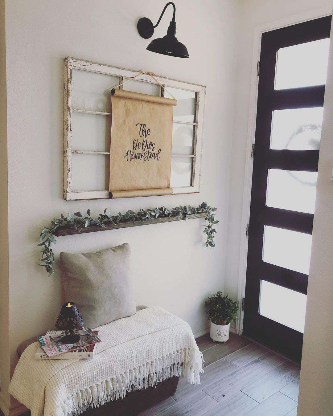 A scroll hung over a vintage window frame