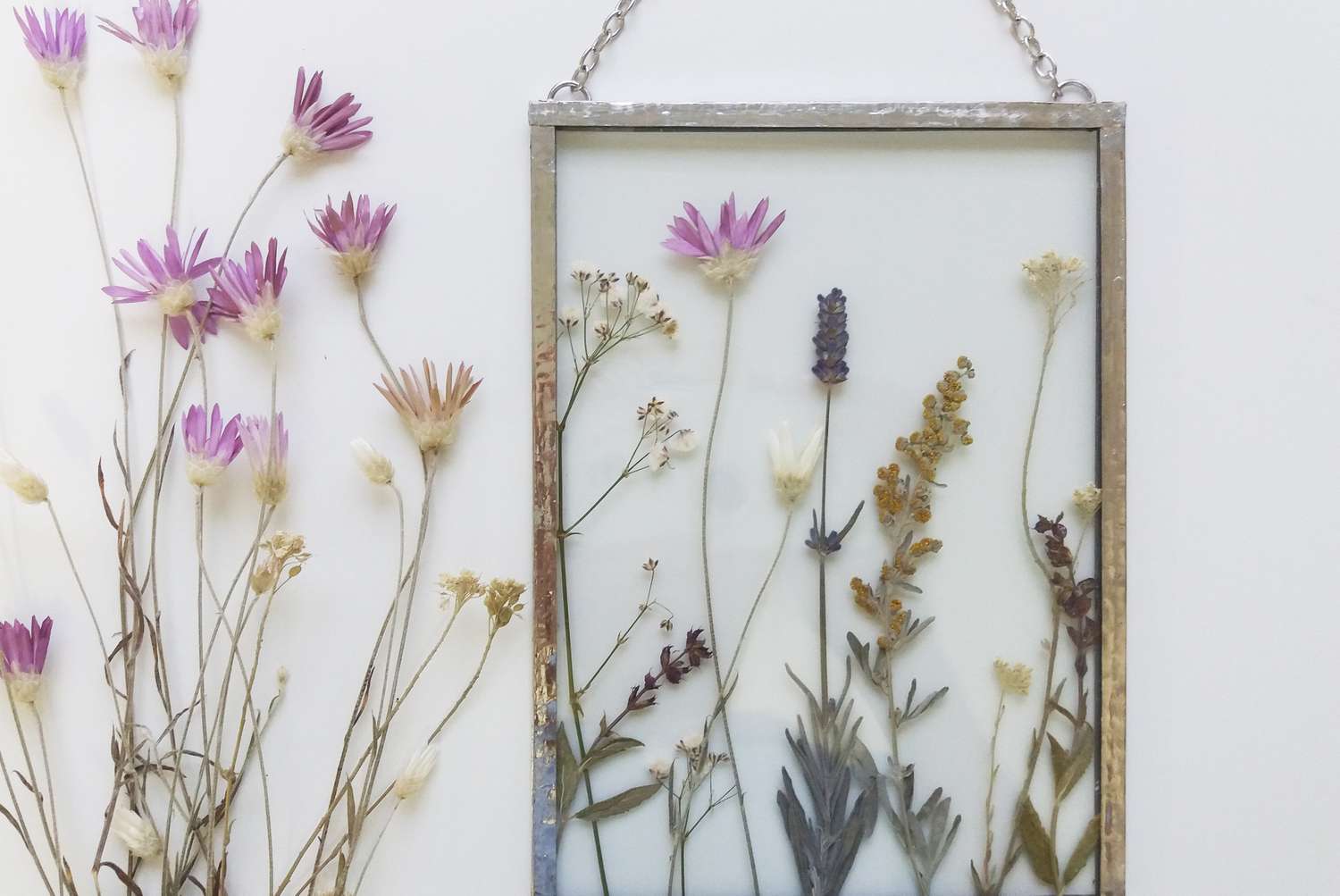 Framed pressed flowers in tiffany technique in stained glass